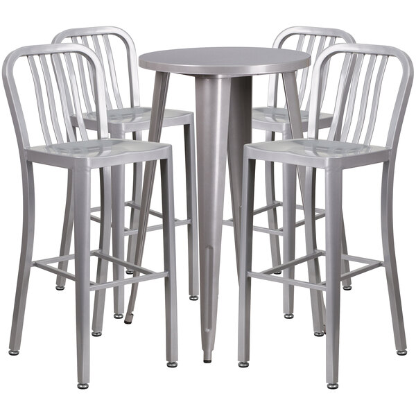 A Flash Furniture silver metal bar height table with four chairs with a white surface.