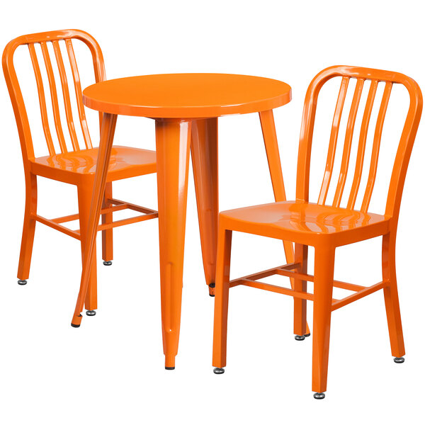 An orange metal table and chairs set.