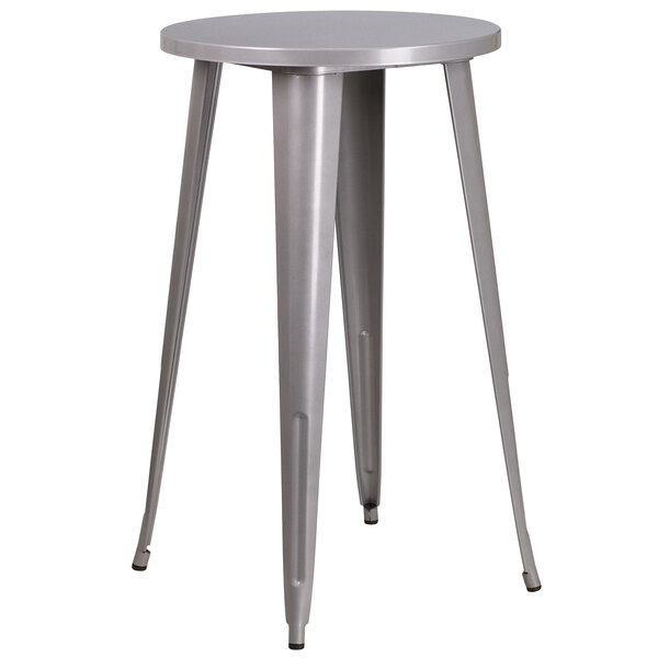 A Flash Furniture round silver metal bar height table with legs and 4 square seat backless stools.
