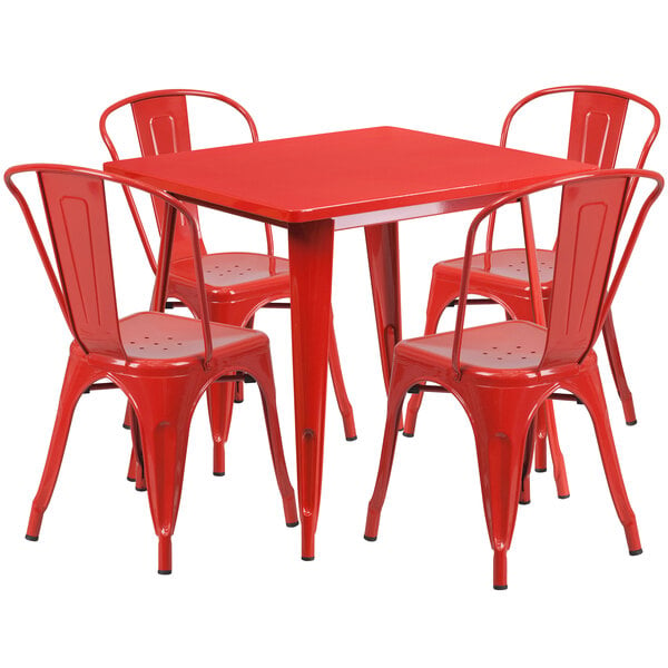 A Flash Furniture red metal table with four chairs.