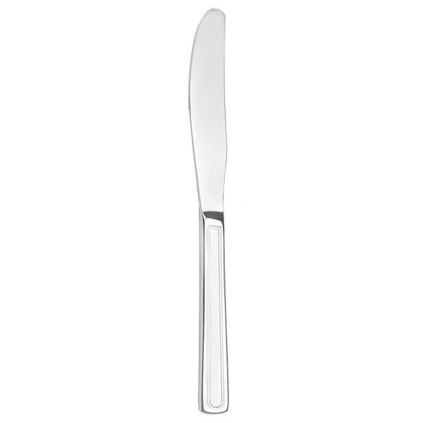 A Walco stainless steel dinner knife with a silver handle.