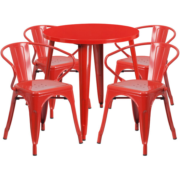 A Flash Furniture red metal table and chairs set.