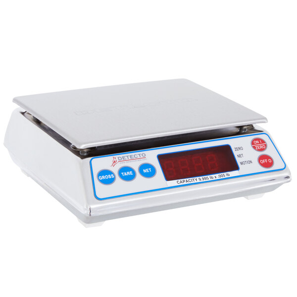 A white Cardinal Detecto digital scale with a red display.