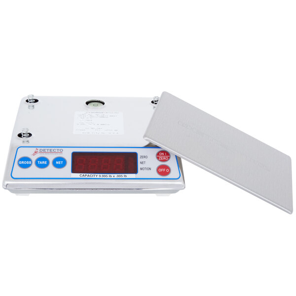A white Cardinal Detecto digital portion scale with a red display.