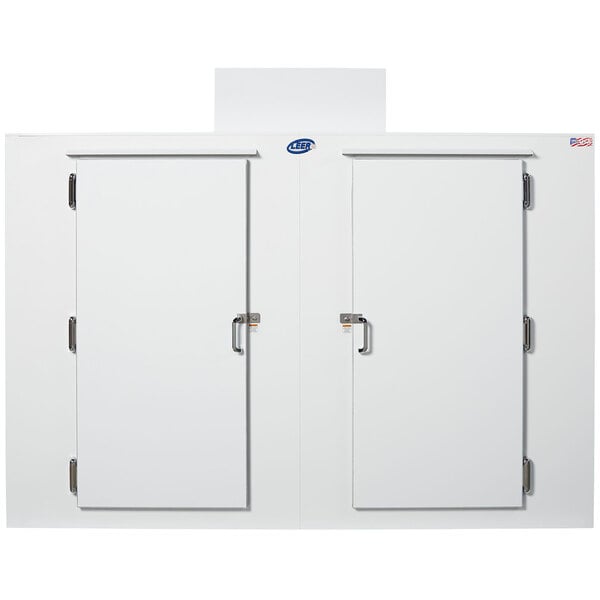 A white refrigerator with two doors.