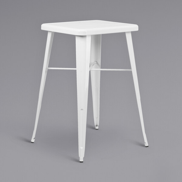 A white metal square table with two white metal stools.