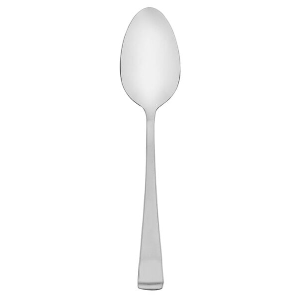 A Walco stainless steel dessert spoon with a long handle on a white background.