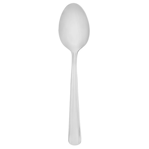 A Walco stainless steel serving spoon with a white handle on a white background.