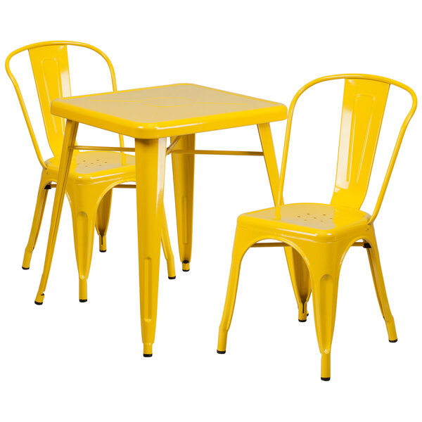 A yellow metal table and chairs set.