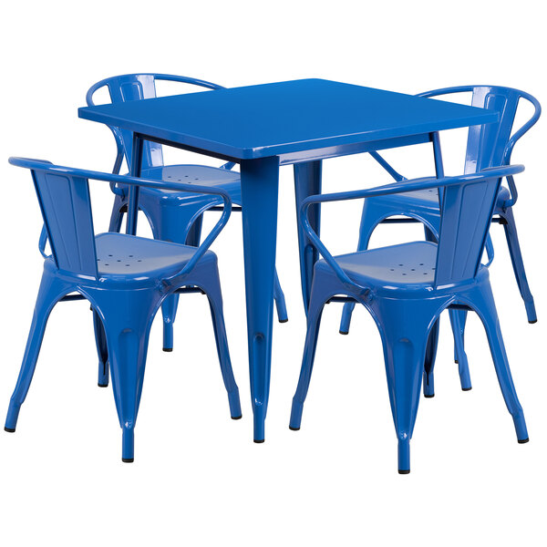 A blue metal Flash Furniture dining table and chairs set on an outdoor patio.