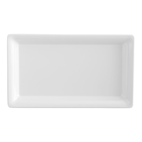 A rectangular white platter with slightly raised edges, viewed from above.