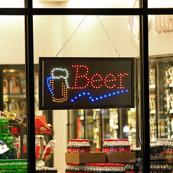 A lit up rectangular LED sign that says "Beer" with a beer and a glass of beer.