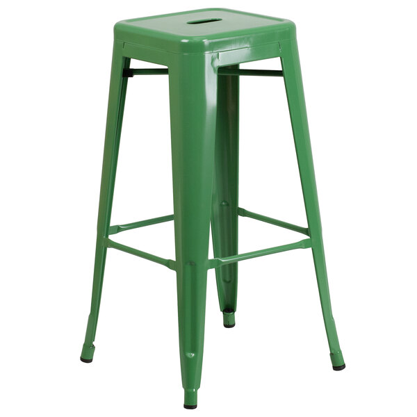 A green metal square seat backless stool.