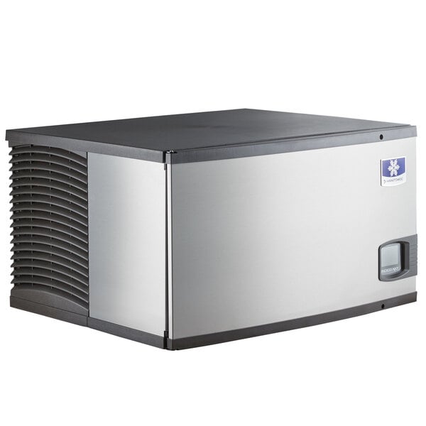 A black and silver Manitowoc Indigo NXT air cooled ice machine with a square top.