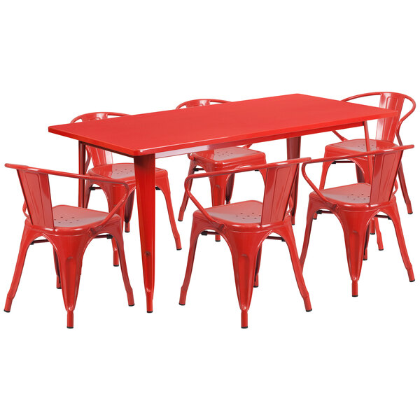 a close-up of a red table and chairs