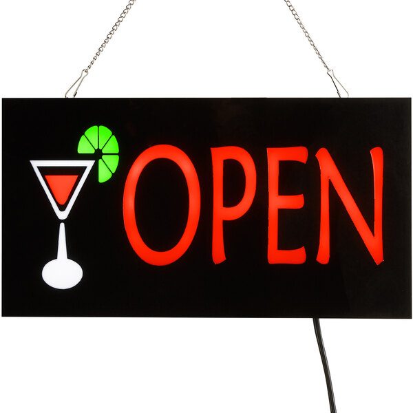 A white rectangular LED sign that says "Cocktail Open" in black and red letters.