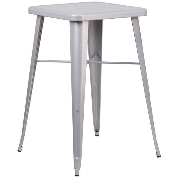 a silver stool with legs