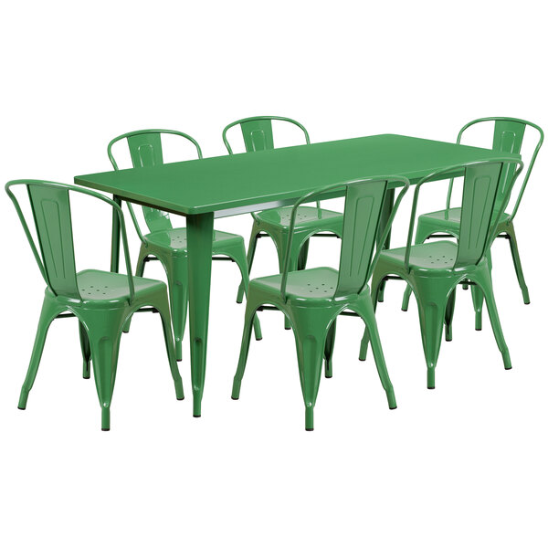 A green metal rectangular dining table with a green chair next to it.