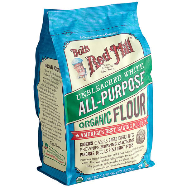 A blue bag of Bob's Red Mill organic unbleached all-purpose flour.