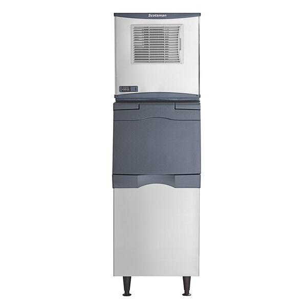 A grey rectangular Scotsman air cooled ice machine with a white lid and vent.