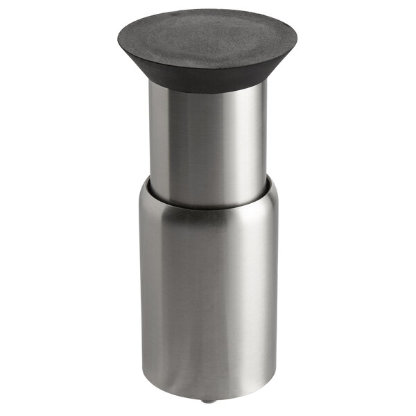 A silver metal ServIt adjustable leg on a metal container.