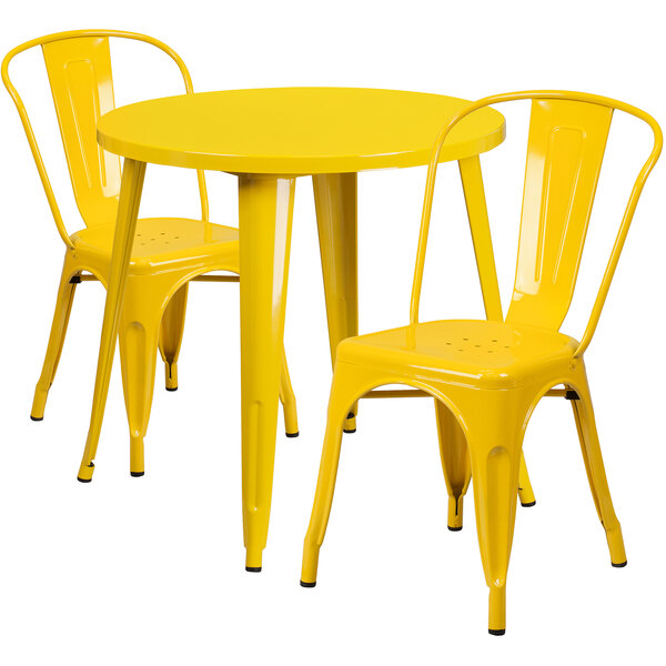 A Flash Furniture yellow metal table with two chairs.