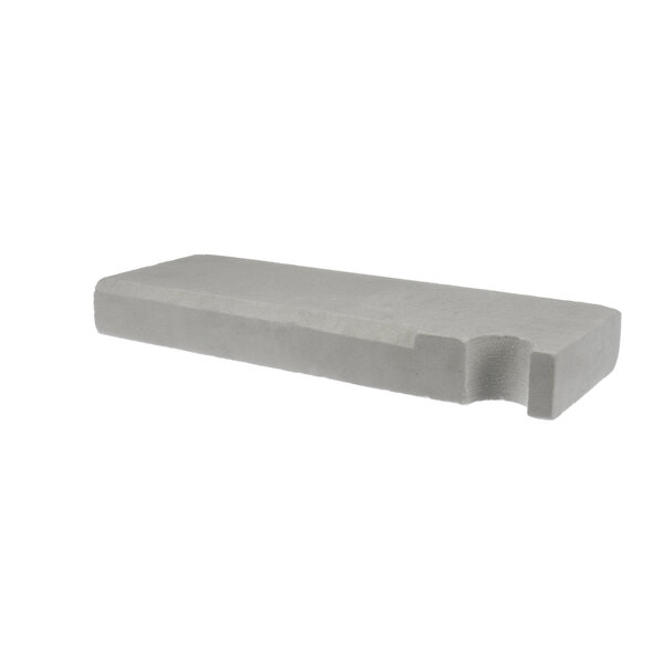 A white rectangular object with a grey hole in the middle.