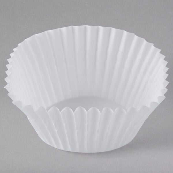 A white fluted baking cupcake wrapper.