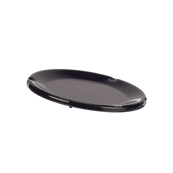 A black round pan with a hole in the middle and a silver handle.