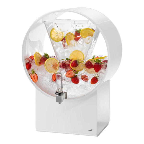A white acrylic barrel beverage dispenser with an infusion chamber, filled with ice, strawberries, and lemon slices.