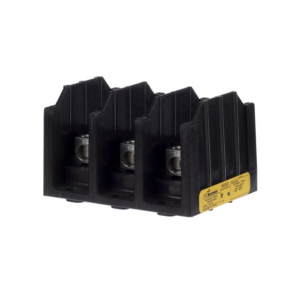 A black plastic Master-Bilt power distribution block holder with metal screws.