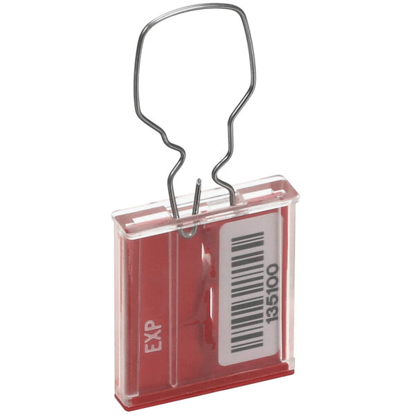 A red plastic clip with a barcode.