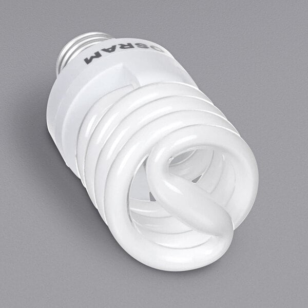 A spiral light bulb on a white background.