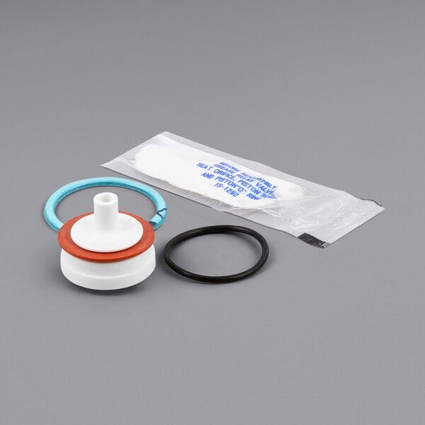 A CMA 1/2 Vac Breaker Repair Kit with a water filter and rubber seal.