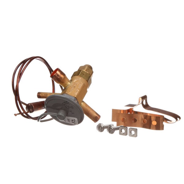 A close-up of a Norlake Expansion Valve with copper and a screw.
