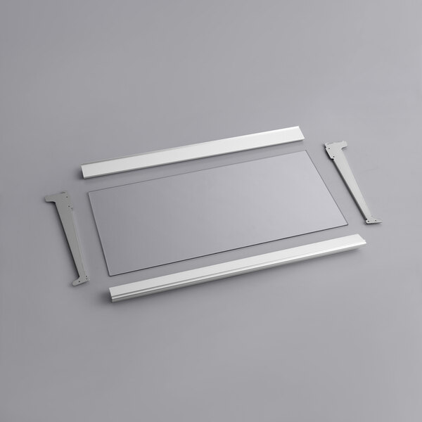 A white rectangular bottom shelf with metal parts.
