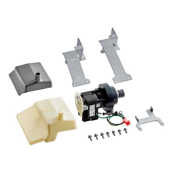 A Manitowoc water pump kit with parts including a white plastic motor.