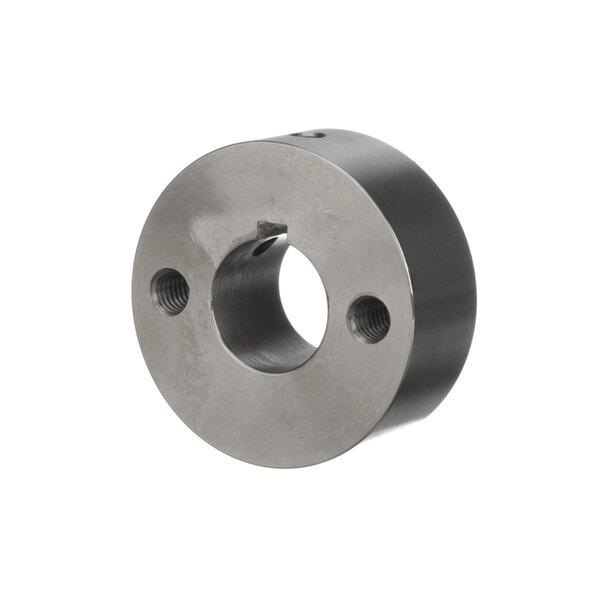 A circular steel cam block with holes.