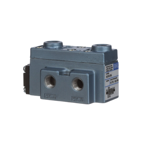 A blue Edlund pressure valve with two valves in a grey metal box with holes.