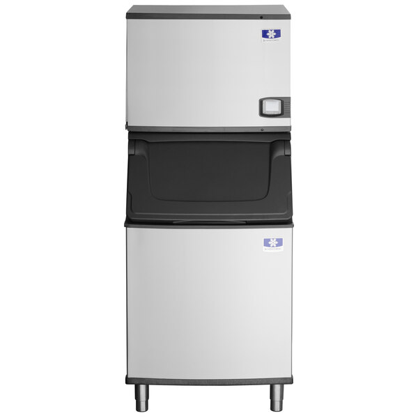 A black rectangular Manitowoc air cooled ice machine with a white lid.