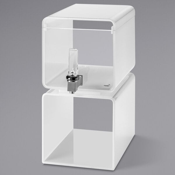 A white plastic cube with a clear lid and a faucet.