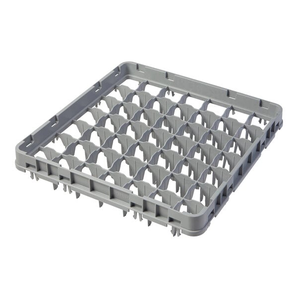 A grey plastic Cambro extender with many small compartments.