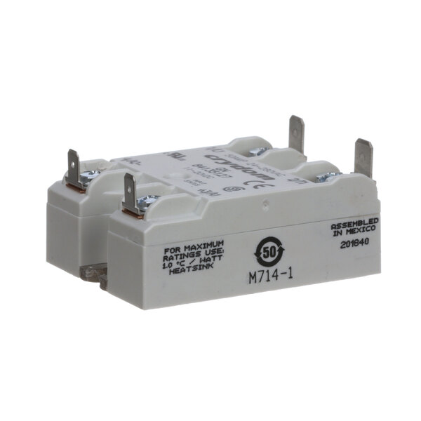 A close-up of a Newco solid state relay with two terminals.