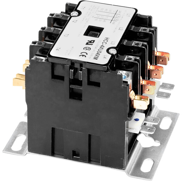 A close-up of a black and white electronic Crown Steam contactor.
