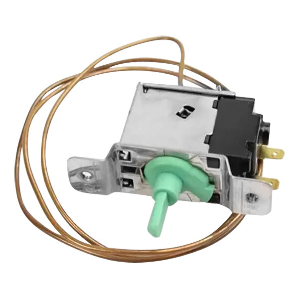 A small metal device with a green knob and a green wire.