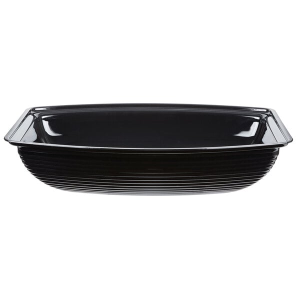 A black rectangular Cambro serving bowl with ribbed sides.