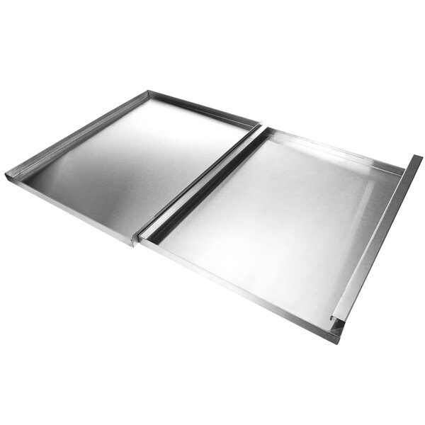 A metal box with a Silver King door kit lid open.