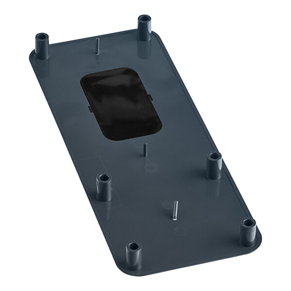 A black rectangular Scotsman ice sensor cover with screws.