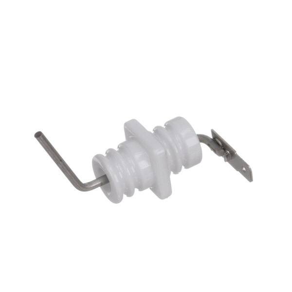 A white plastic electrical insulator with a metal rod.