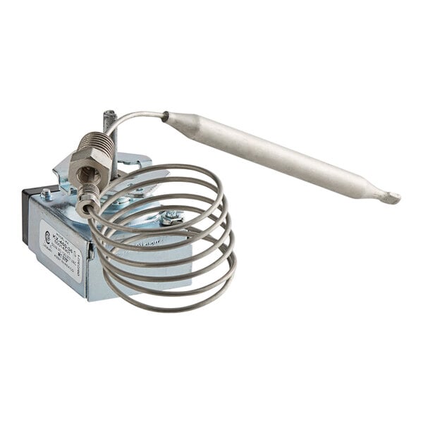 A Pitco electric thermostat with a wire attached to it.